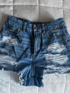 American Eagle Outfitters light blue denim shorts with frayed trim